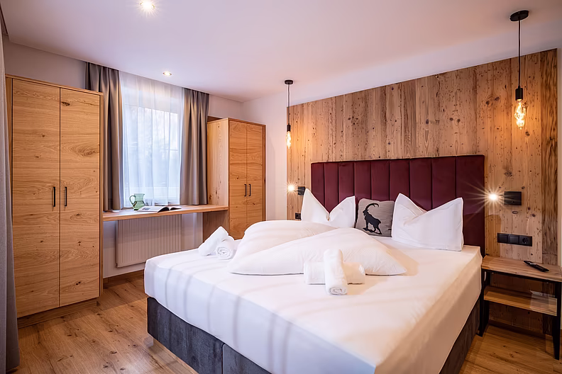 Apart LAURA Appartement STEINBOCK Schlafzimmer 1